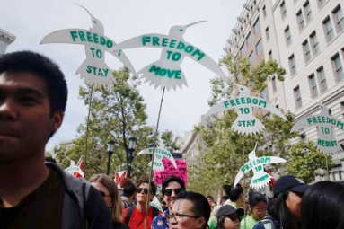 Hundreds of people march in Oakland Celebrates May Day