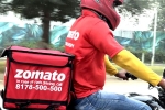 Zomato latest, Zomato new updates, zomato has half its net loss, Food delivery
