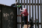 punjabi women, entering US via mexico, video clip shows punjabi women children crossing border fence into u s, Punjabis