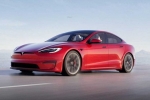Tesla new electric car breaking news, Tesla new electric car updates, tesla to launch electric hatchback without a steering wheel, Tesla new electric car